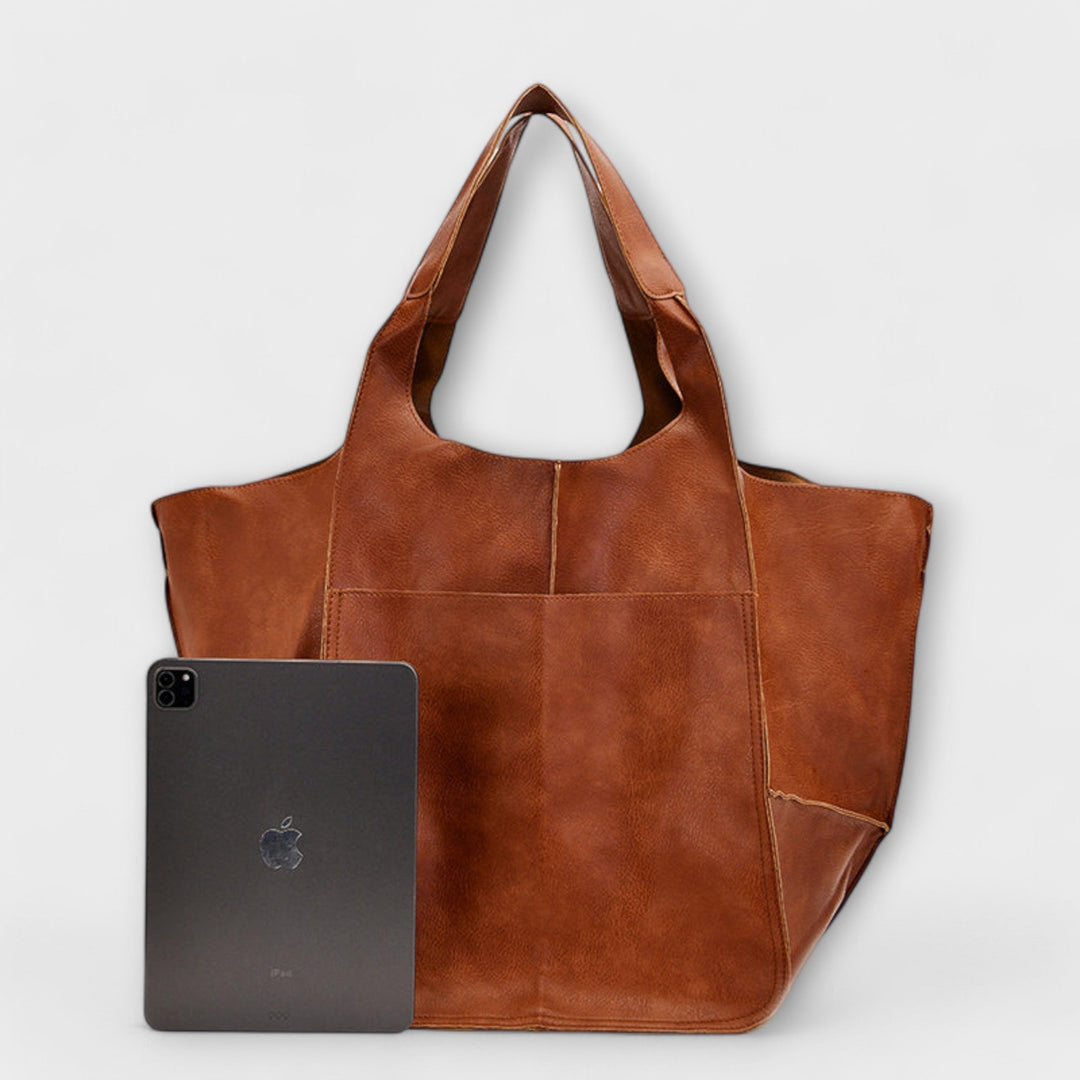 Spacious leather weekend travel bag for women, autumn collection