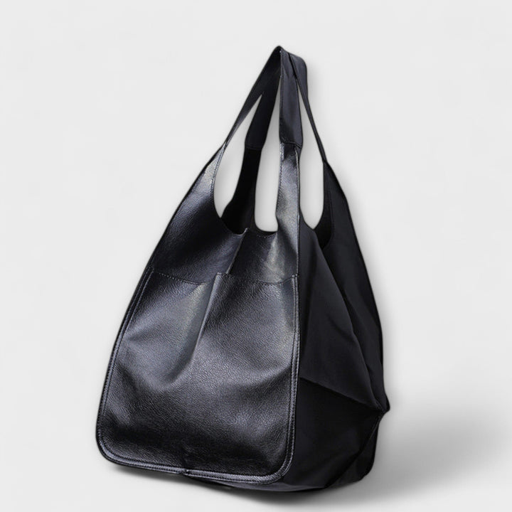 Spacious leather weekend travel bag for women, autumn collection