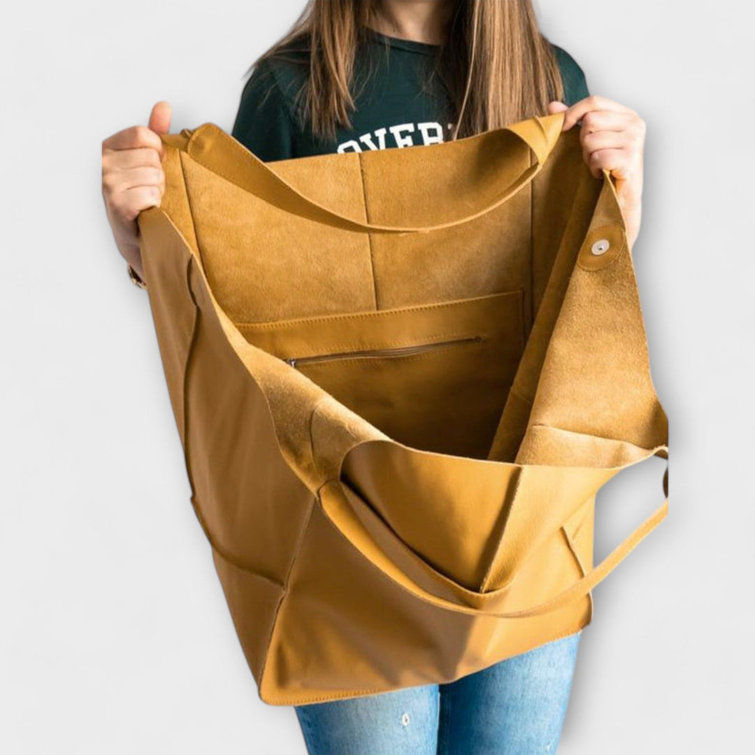 Spacious leather weekend travel bag for women, autumn collection