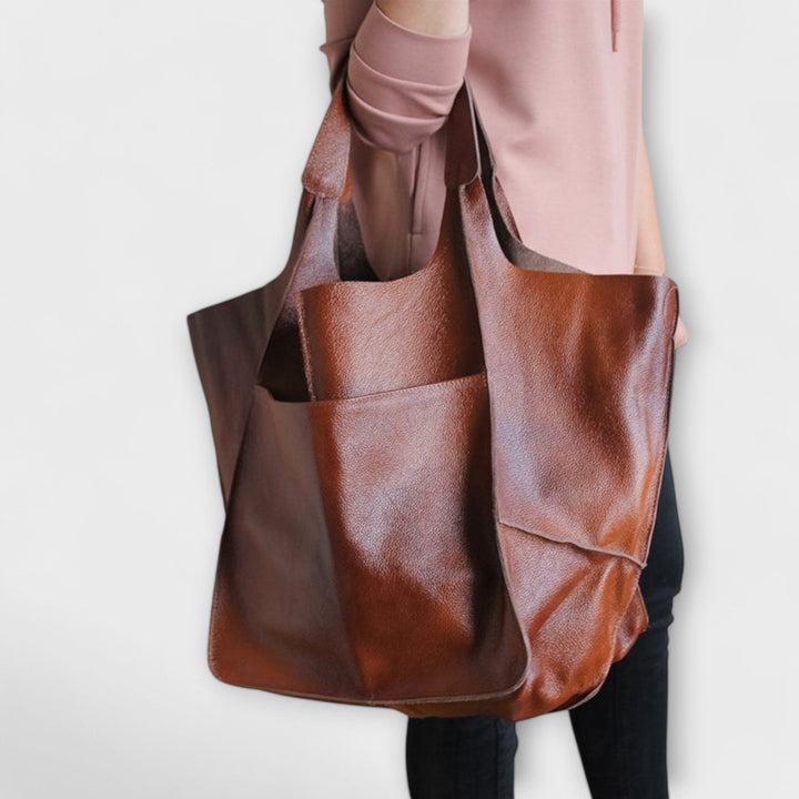Spacious leather weekend travel bag for women, autumn collection