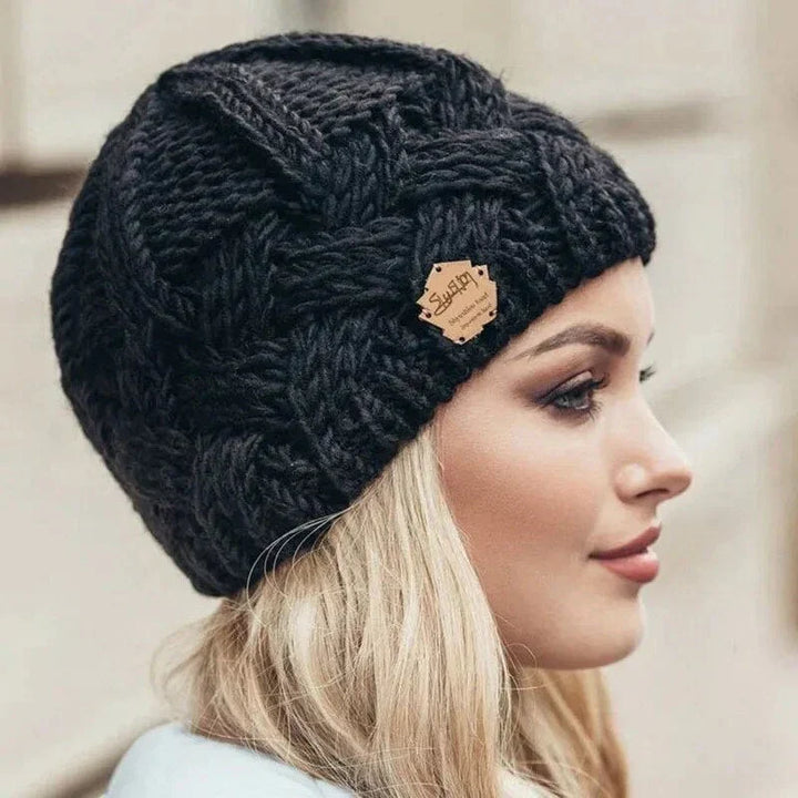 Berretto da donna in morbida maglia lavorata a coste, dalla vestibilità aderente, per l’autunno
