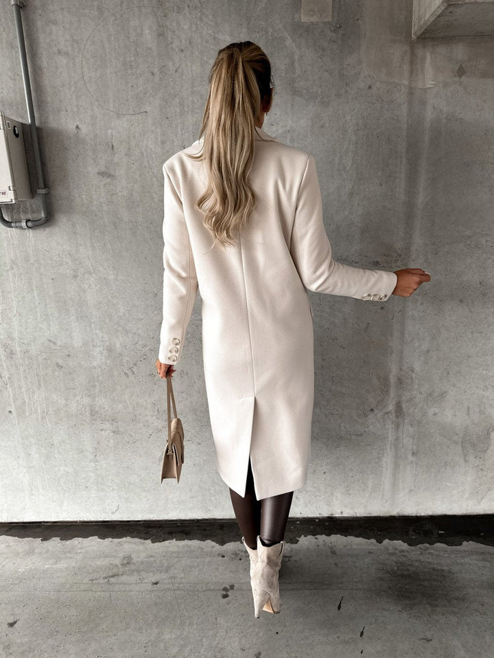 Cappotto lungo da donna in misto lana, dal taglio elegante e aderente, per l’autunno