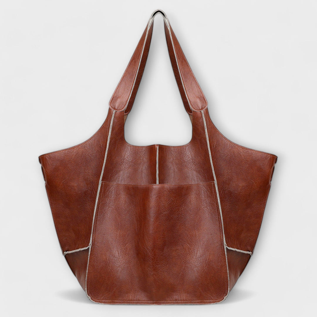 Spacious leather weekend travel bag for women, autumn collection
