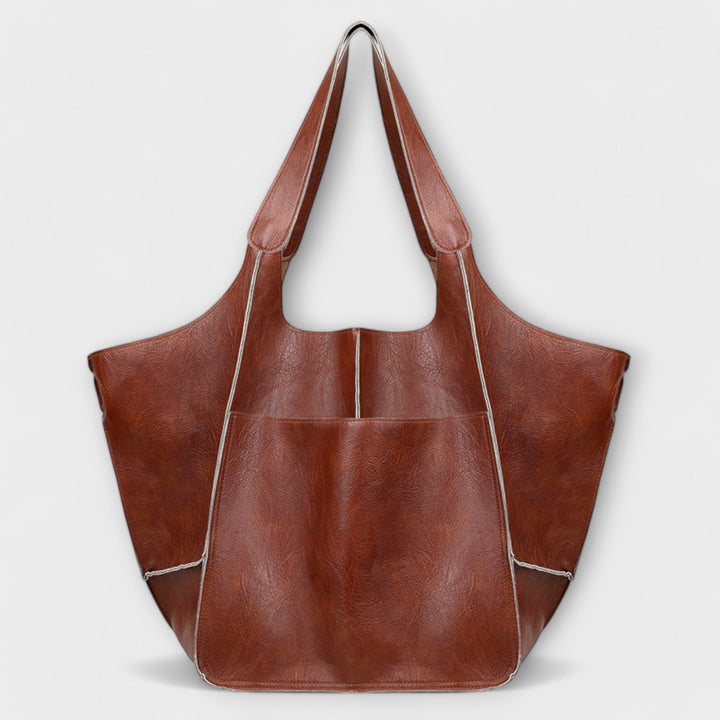 Spacious leather weekend travel bag for women, autumn collection