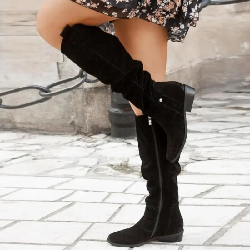 Elegant women’s over-the-knee boots with a low heel for autumn and everyday outfits