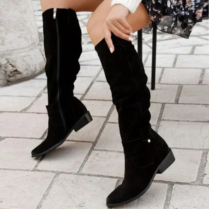 Elegant women’s over-the-knee boots with a low heel for autumn and everyday outfits