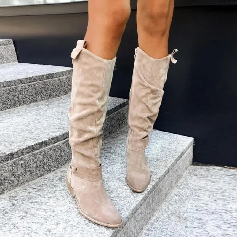 Elegant women’s over-the-knee boots with a low heel for autumn and everyday outfits
