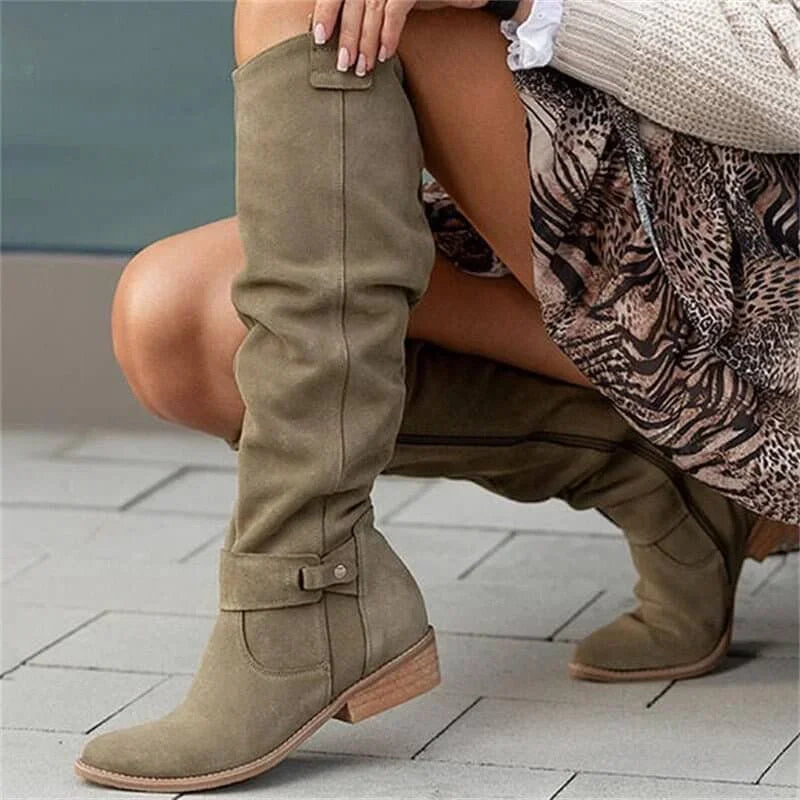 Elegant women’s over-the-knee boots with a low heel for autumn and everyday outfits