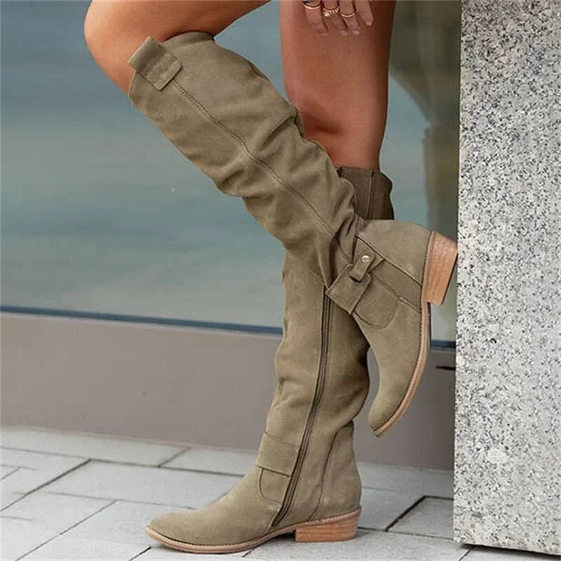 Elegant women’s over-the-knee boots with a low heel for autumn and everyday outfits
