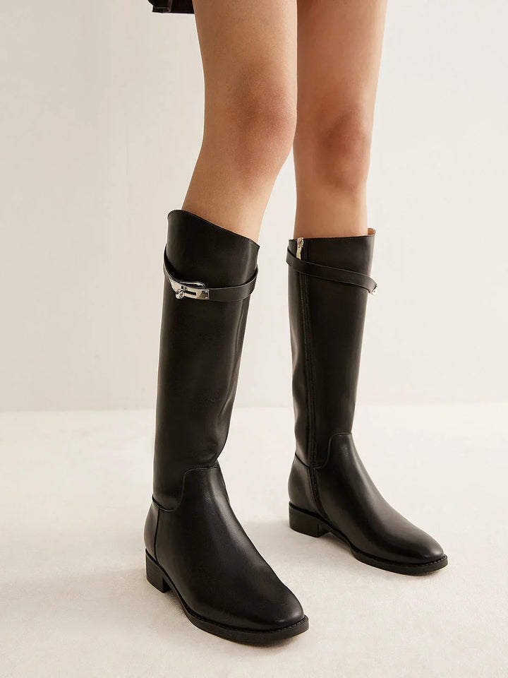 Women's autumn riding boots with decorative buckles and a comfortable insole