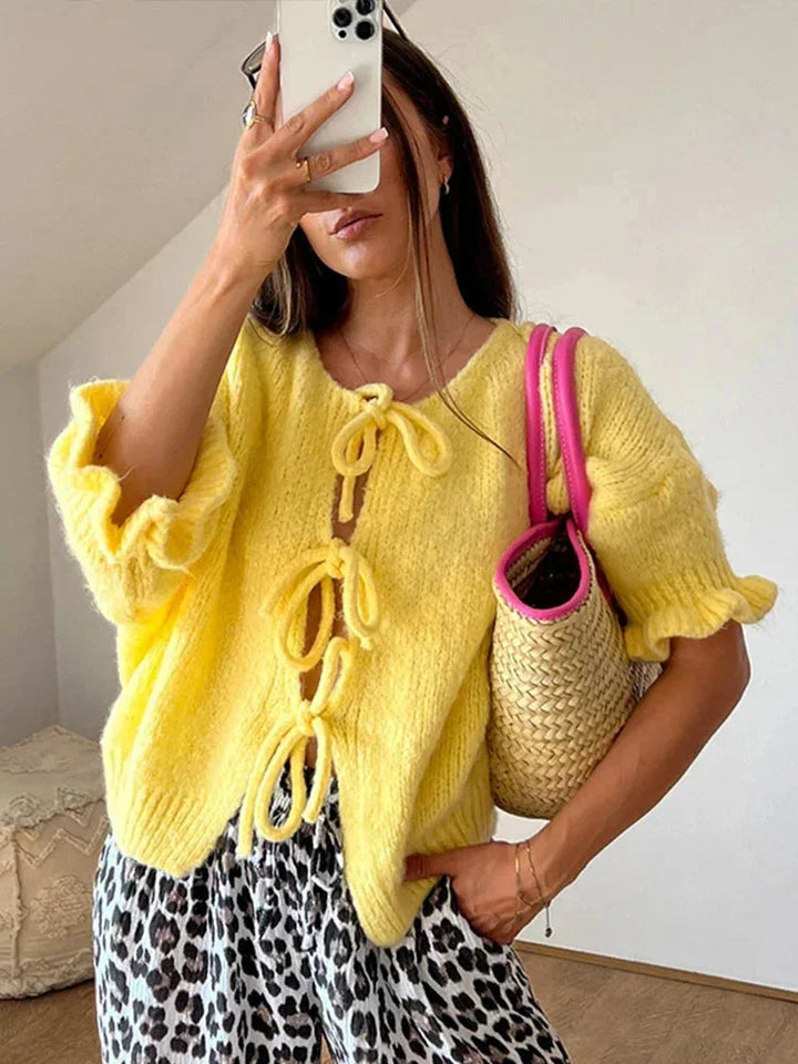Cardigan femme en maille de laine avec des nœuds et coupe ouverte pour l'automne