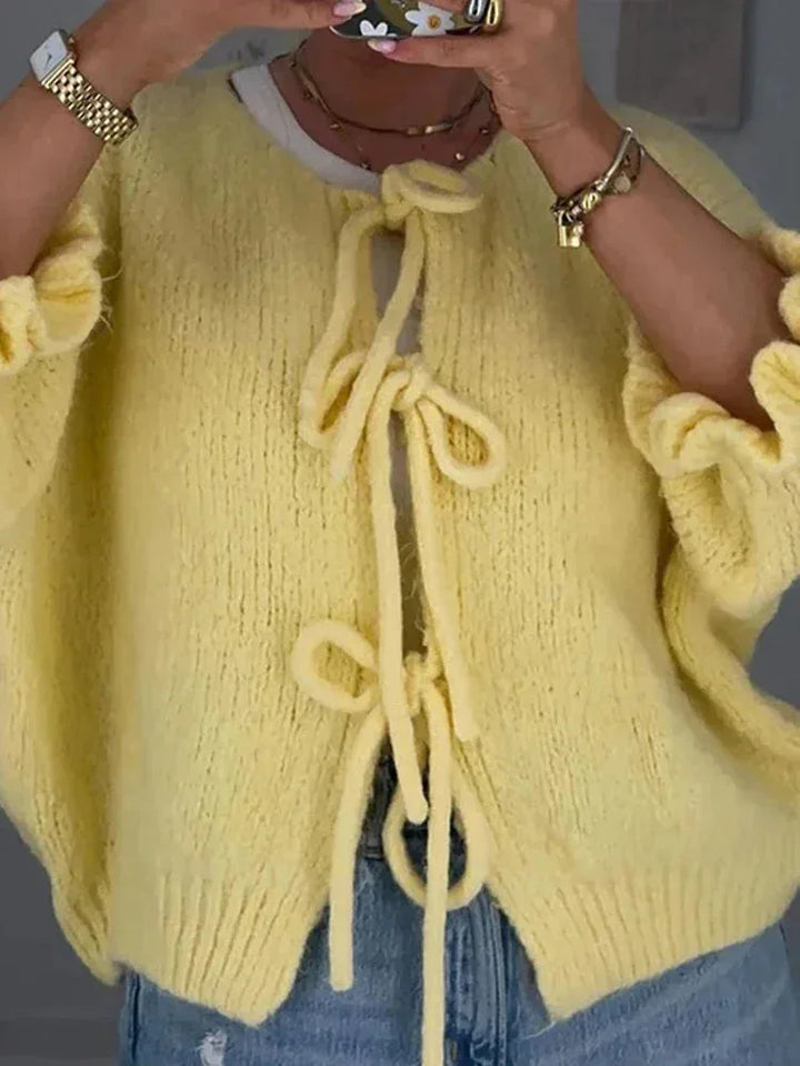 Cardigan femme en maille de laine avec des nœuds et coupe ouverte pour l'automne
