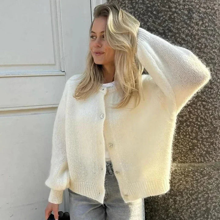 Women’s long-sleeved knitted cardigan with an animal print for autumn