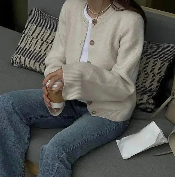 Women's knit cardigan for autumn with trendy buttons in an elegant style