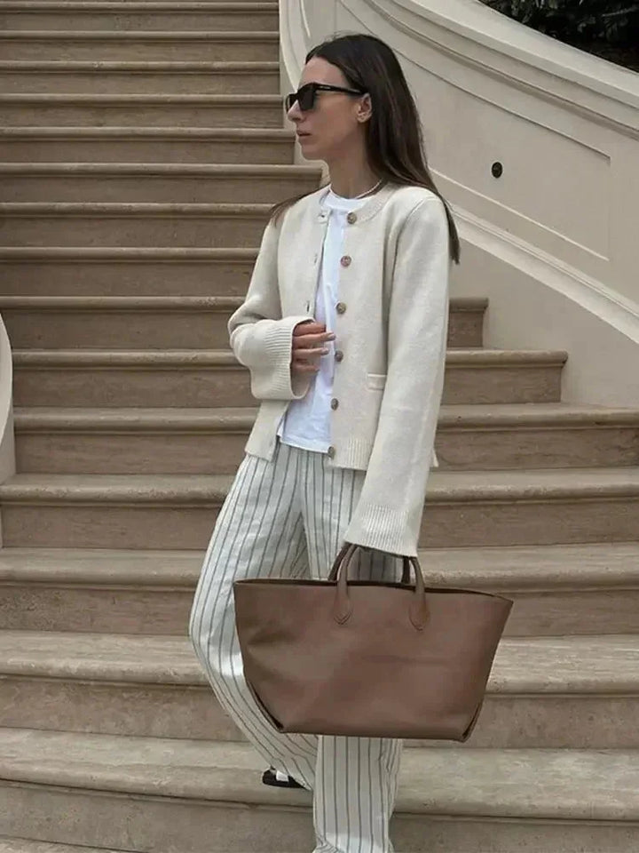 Women's knit cardigan for autumn with trendy buttons in an elegant style