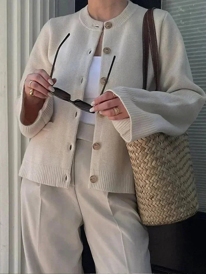 Women's knit cardigan for autumn with trendy buttons in an elegant style