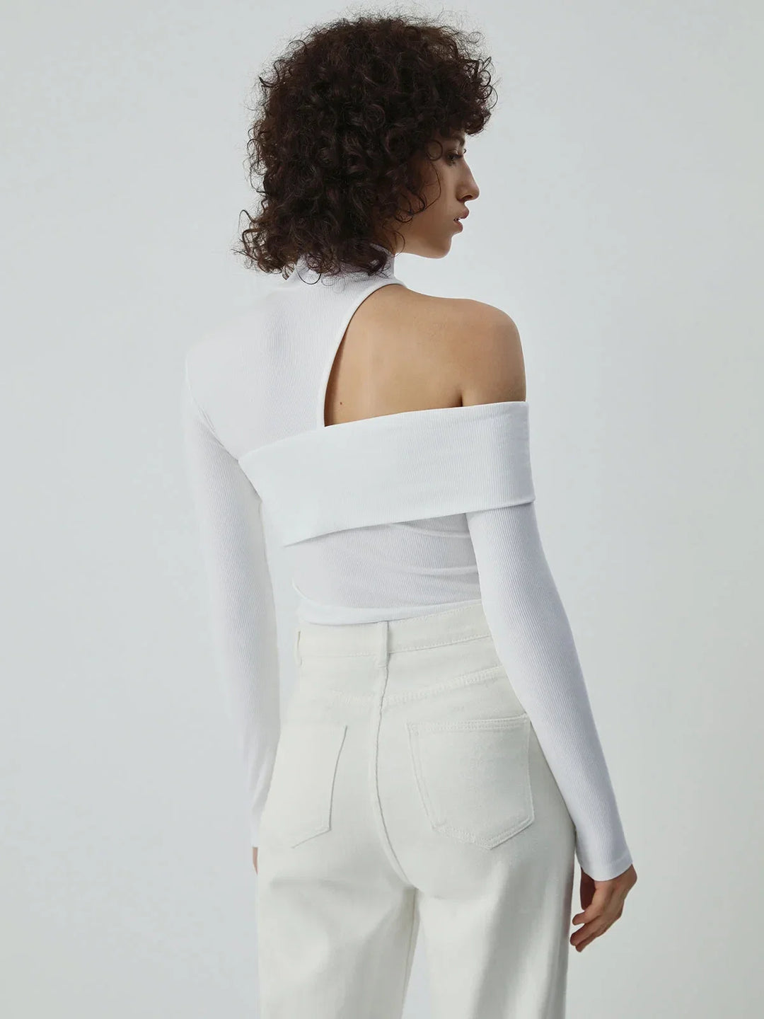 Blusa asimétrica de algodón para mujer, con cuello alto y abertura, para otoño