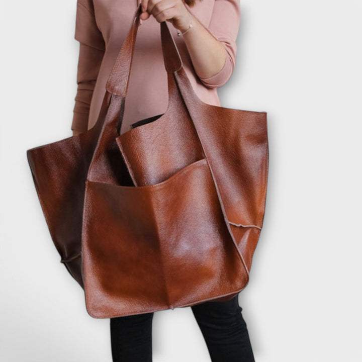 Spacious leather weekend travel bag for women, autumn collection