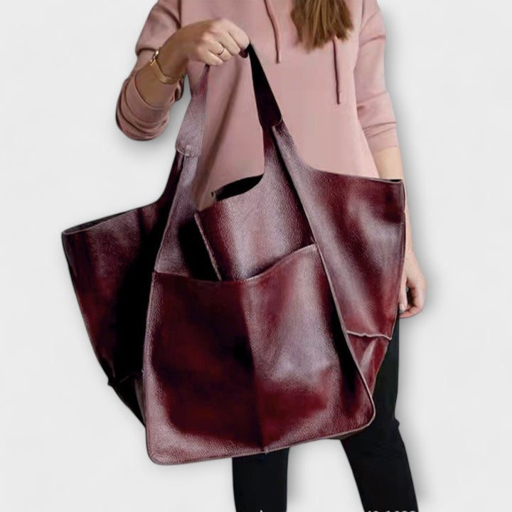 Spacious leather weekend travel bag for women, autumn collection