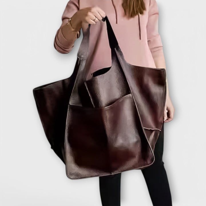 Spacious leather weekend travel bag for women, autumn collection