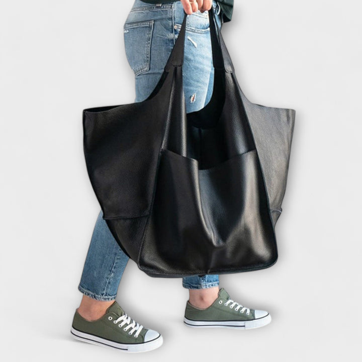 Spacious leather weekend travel bag for women, autumn collection