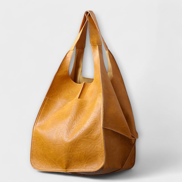 Spacious leather weekend travel bag for women, autumn collection